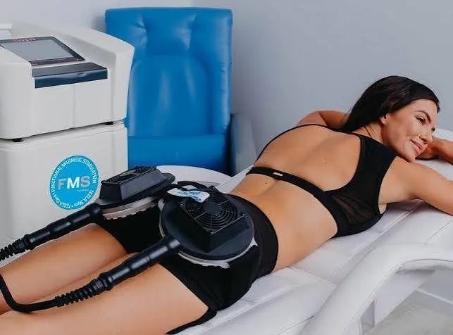 Dual Tesla Former applicators treating abdomen and thigh